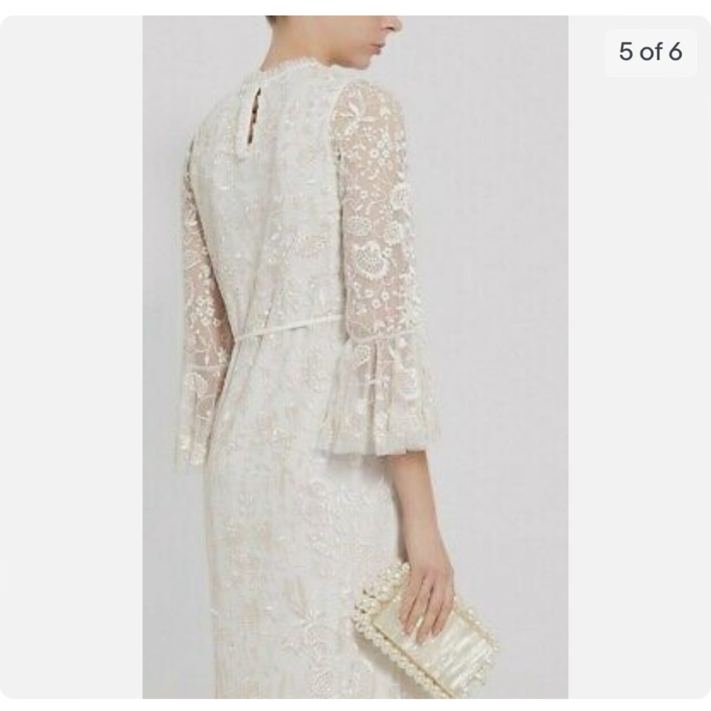Beautiful ivory needle and thread dress